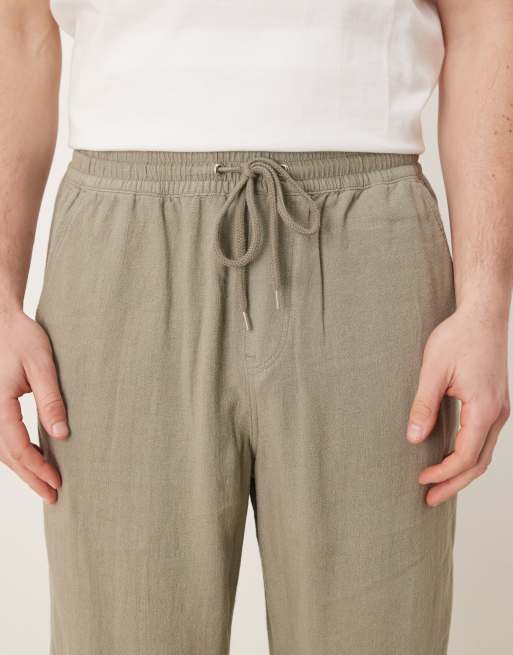 ASOS DESIGN baggy fit pull on linen mix pants in khaki 
