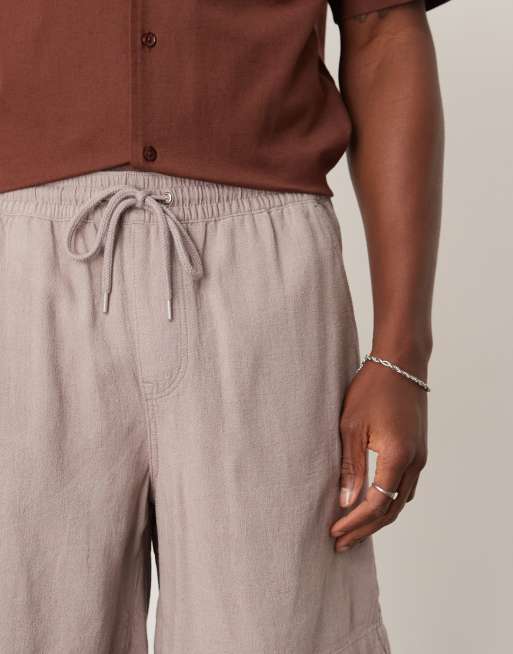 ASOS DESIGN baggy fit pull on linen mix shorts in gray , 4 of 5