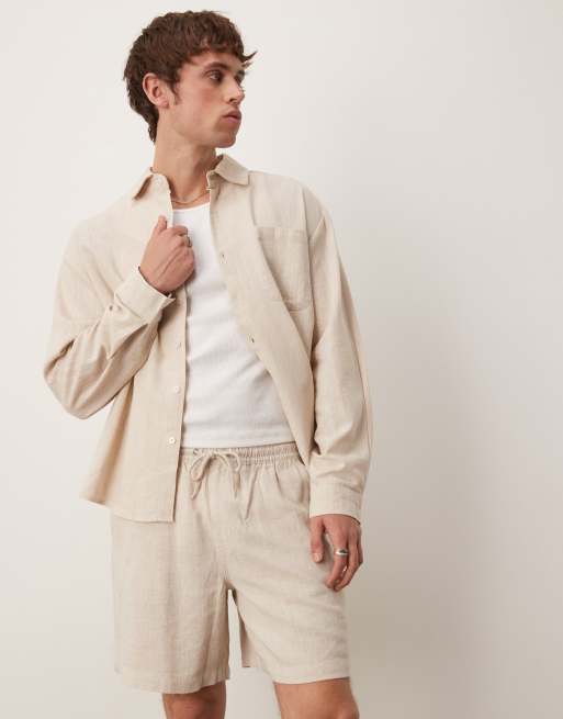 ASOS DESIGN baggy fit pull on linen rich short in stone 