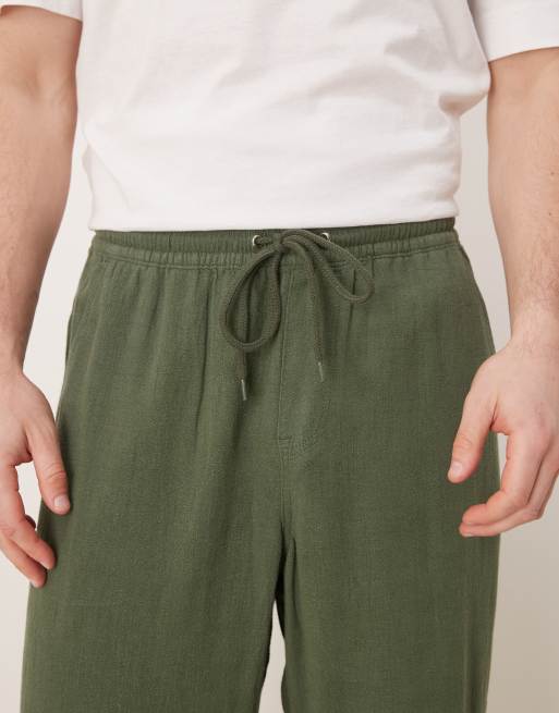 ASOS DESIGN baggy fit pull on linen rich trouser in dark green , 2 of 5