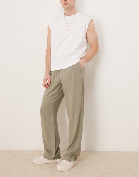 ASOS DESIGN baggy fit pull on linen rich trouser in khaki - view 1