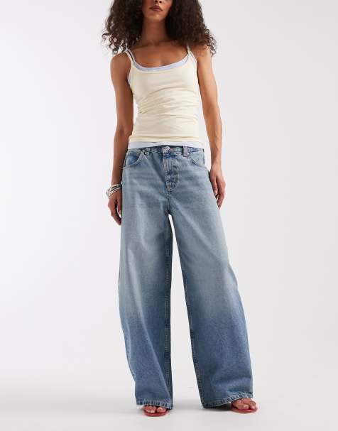 ASOS DESIGN baggy horseshoe jeans in light mid wash - view 1