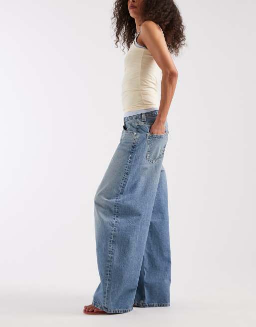 ASOS DESIGN baggy horseshoe jeans in light mid wash, 3 of 5