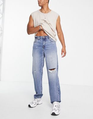 ASOS DESIGN baggy jean in light wash with knee rip
