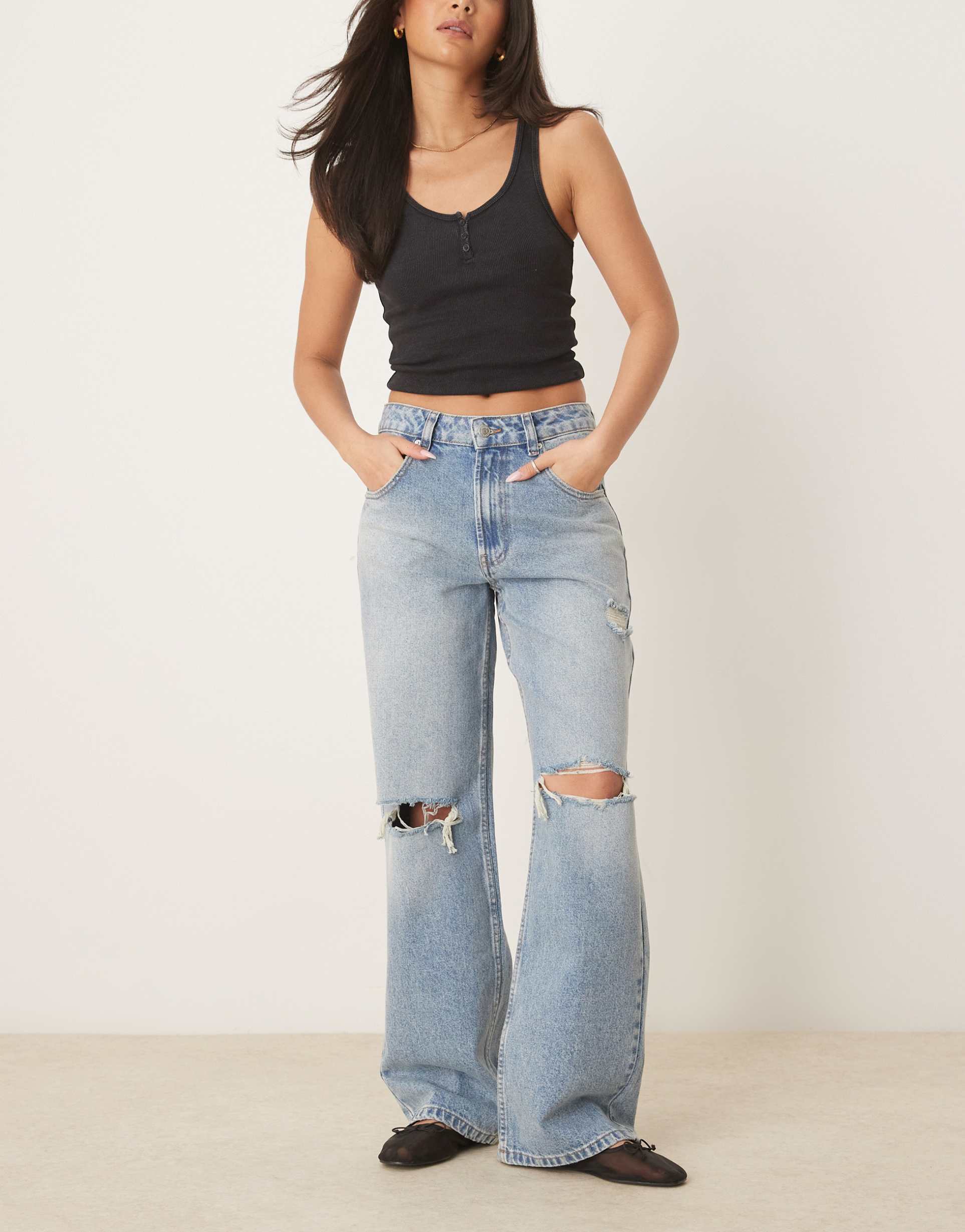 asos design baggy jean with rips in mid blue