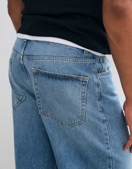 ASOS DESIGN baggy jeans i ljusblå tvätt med revor, 4 av 5