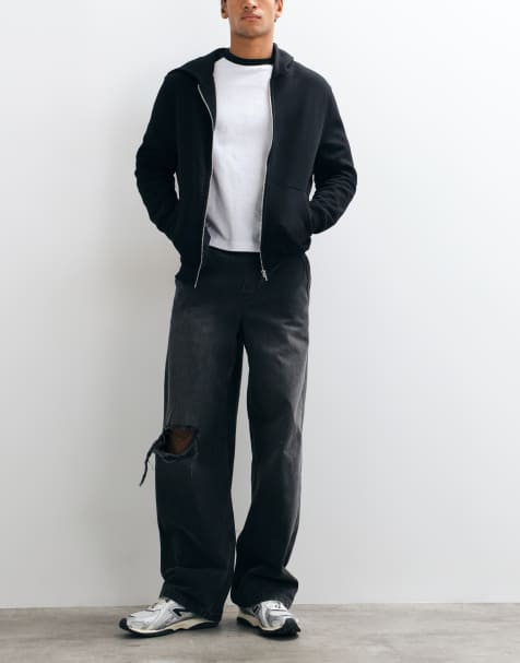 ASOS DESIGN baggy jeans i vasket sort med huller og elastisk talje - view 1