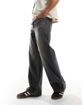 ASOS DESIGN – Baggy-Jeans in grauer Waschung mit weitem Saum - view 1