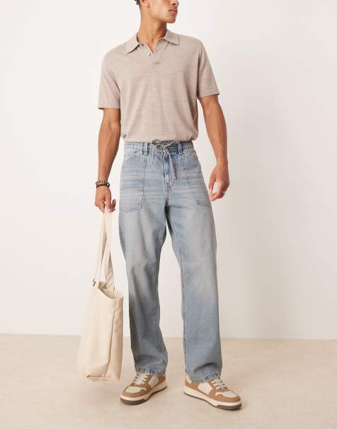 ASOS DESIGN – Baggy-Jeans in hellblau getönter Waschung mit Kordelzug - view 1
