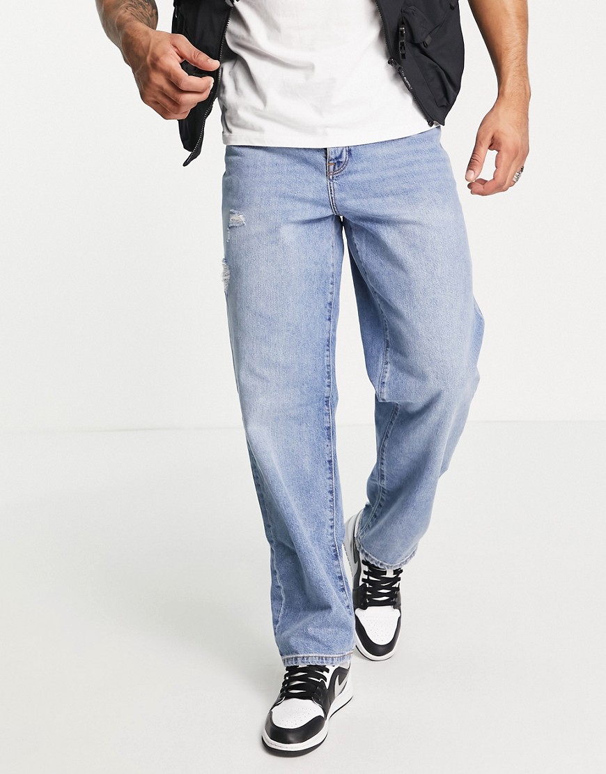 ASOS DESIGN baggy jeans in light wash blue with abrasions