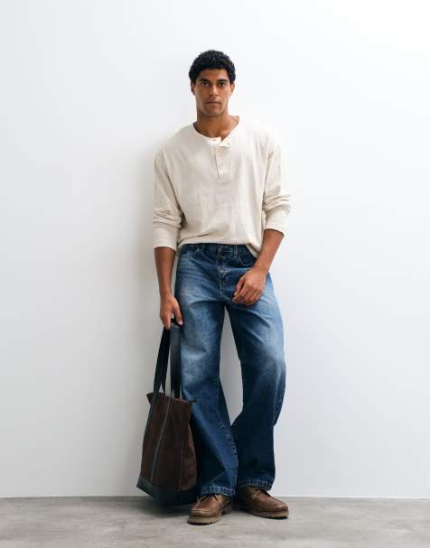ASOS DESIGN baggy jeans in mid wash blue with exposed buttons - view 1