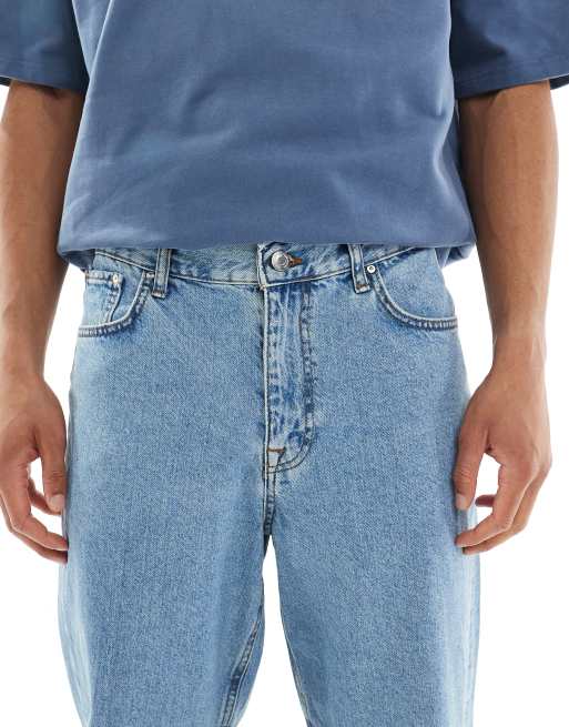 ASOS DESIGN low rise baggy jeans in mid wash blue