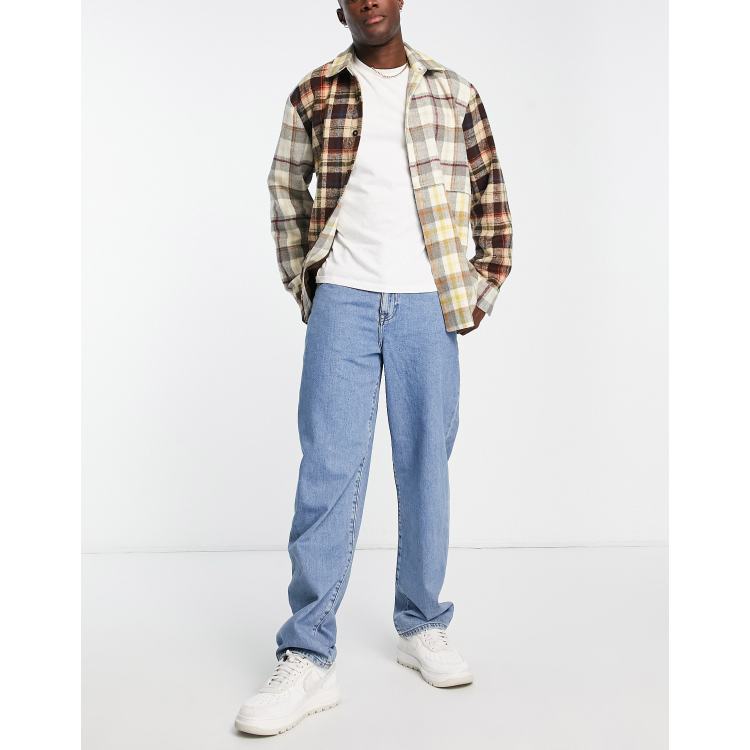 ASOS DESIGN relaxed tapered jeans in vintage mid wash