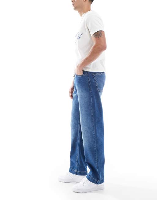 ASOS DESIGN baggy jeans in midwash blue with tie