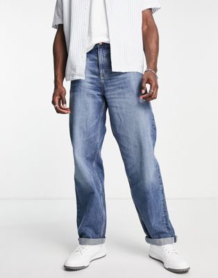 Asos Design Stretch Tapered Jeans In Selvage Denim In Mid Wash-blue
