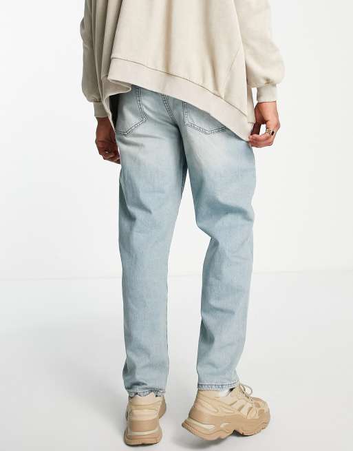 ASOS DESIGN baggy jeans in light wash blue with abrasions - ShopStyle