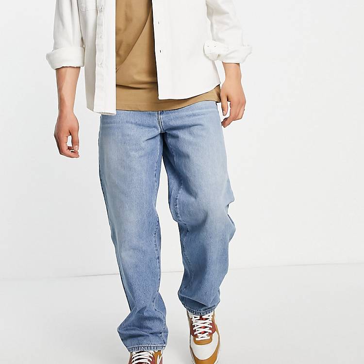 ASOS Herren Kleidung Hosen & Jeans Jeans Baggy & Boyfriend Jeans Baggy jeans in mid wash with abrasions 