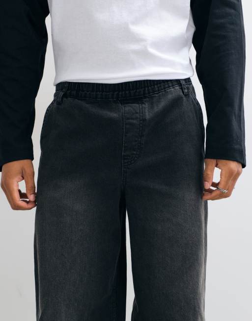 ASOS DESIGN baggy jeans in washed black with rips and elasticated waist, 4 of 5