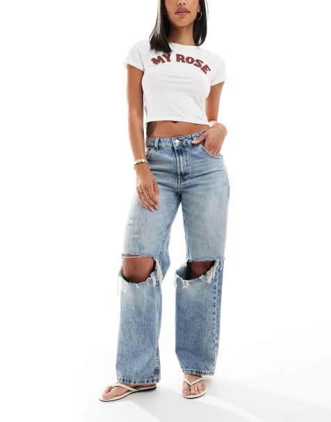 ASOS DESIGN - Baggy jeans met lage taille en scheuren in licht middenblauw - view 1