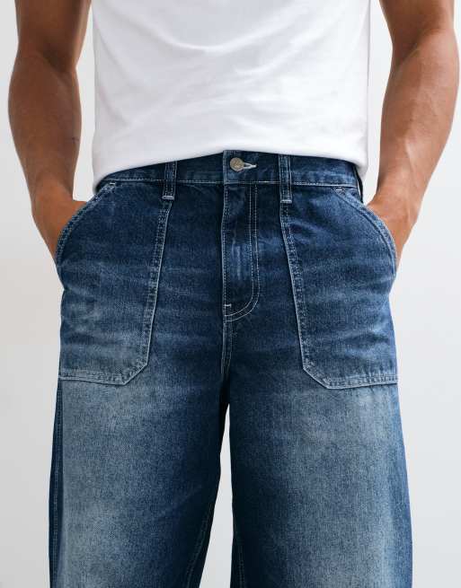 ASOS DESIGN baggy jeans met opgestikte zakken in middenblauw, 4 van 5