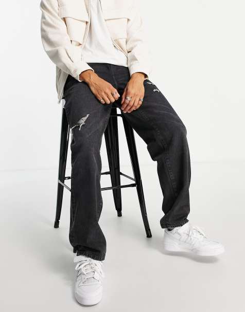 ASOS DESIGN - Baggy jeans met slijtageplekken en zwarte wassing - view 1