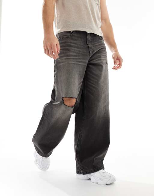 ASOS DESIGN - Baggy jeans met slijtageplekken in verwassen zwart