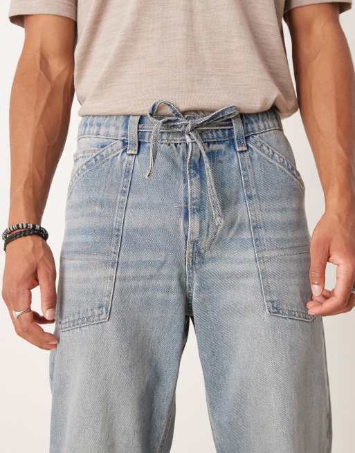 ASOS DESIGN baggy jeans with drawcord in light wash blue with tint, 4 of 5