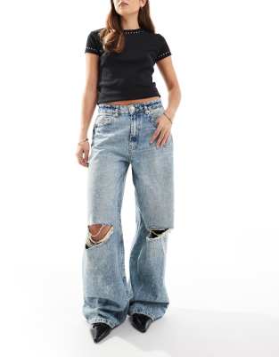 ASOS DESIGN ASOS DESIGN baggy jeans with rips and paint splats in mid blue