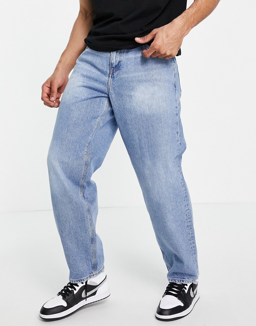 ASOS DESIGN baggy jeans with sustainable 'less thirsty' wash in light blue-Blues