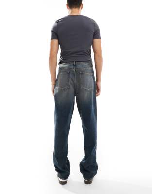 Asos Design Baggy Jeans With Vintage Tint In Blue