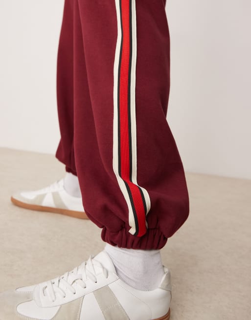 ASOS DESIGN - Baggy joggingbroek met ballonpijpen en bies in bordeauxrood, 5 van 5