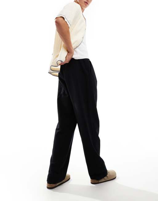 ASOS DESIGN baggy linen look pants in black