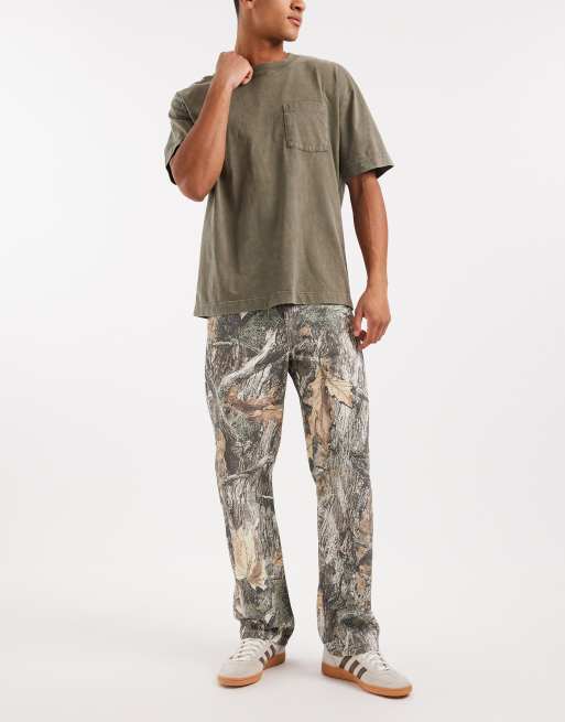 ASOS DESIGN baggy pants in camo