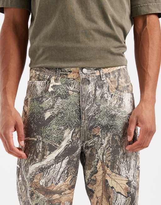 ASOS DESIGN baggy pants in camo