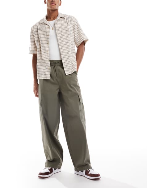 ASOS DESIGN baggy pull on cargo pants in khaki - view 1