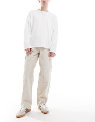 ASOS DESIGN baggy pull on cargo pants in stone - view 1