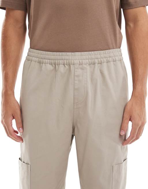 ASOS DESIGN baggy pull on cargo trousers in beige, 4 of 5