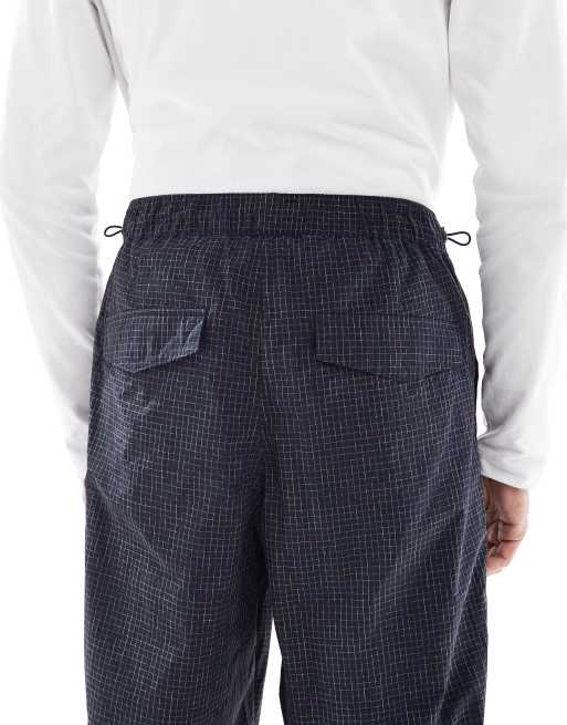 ASOS DESIGN baggy pull on pants in navy plaid, 5 of 5