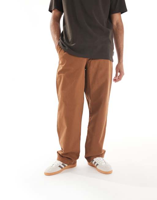 ASOS DESIGN baggy pull on pants with back pocket patch in brown, 3 of 5