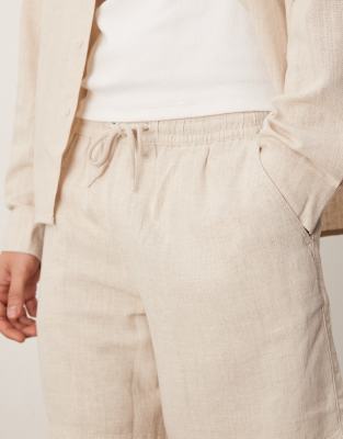 ASOS DESIGN baggy pull on shorts in stone linen rich