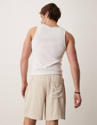 ASOS DESIGN baggy pull on shorts in stone linen rich