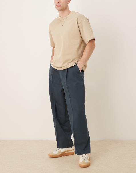ASOS DESIGN balloon fit dress pants with front pleats in dark blue - view 1