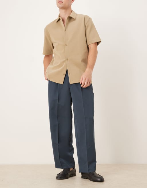 ASOS DESIGN balloon fit dress pants with front pleats in dark blue