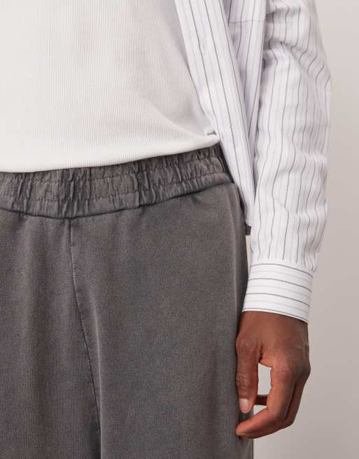 ASOS DESIGN balloon fit washed joggers with seam detail in washed black