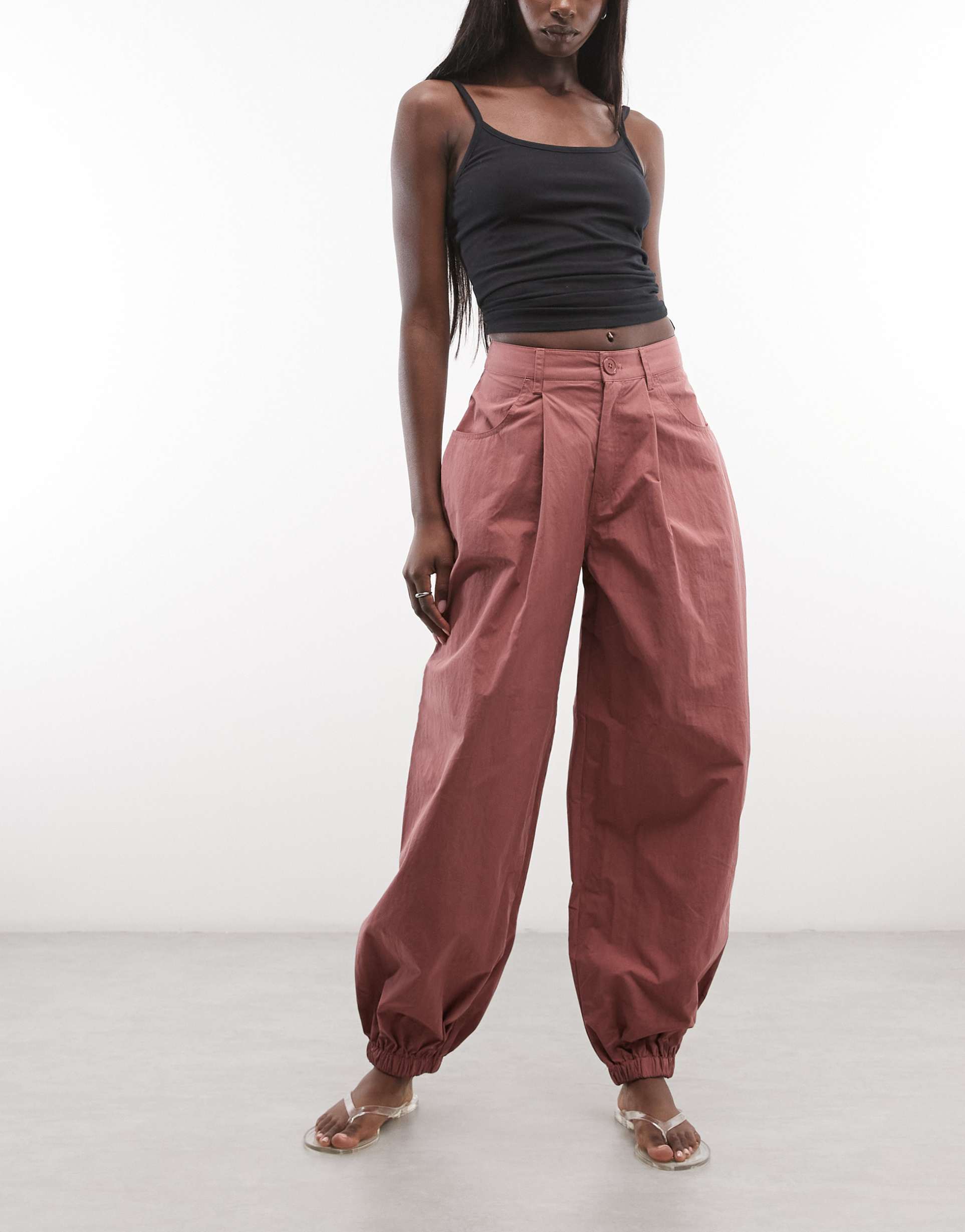 asos design balloon pants with tie cuff detail in brick red