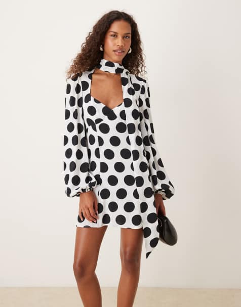 ASOS DESIGN balloon sleeve mini dress with neck scarf in mono polka dot - view 1