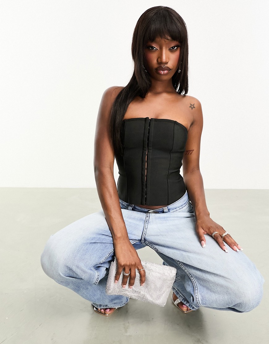 ASOS DESIGN bandage corset top with hook and eye fastening in black