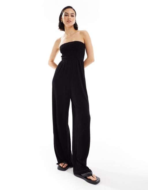 ASOS DESIGN - Bandeau jumpsuit met wijde pijpen en korset in kreukelstof in zwart