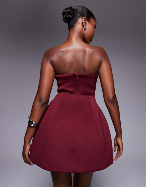 ASOS DESIGN bandeau sculpted mini dress with gold trim in dark cherry