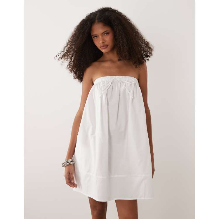 white christmas dresses ASOS DESIGN Micro Pleated Batwing Trapeze Mini Dress In Pink Floral